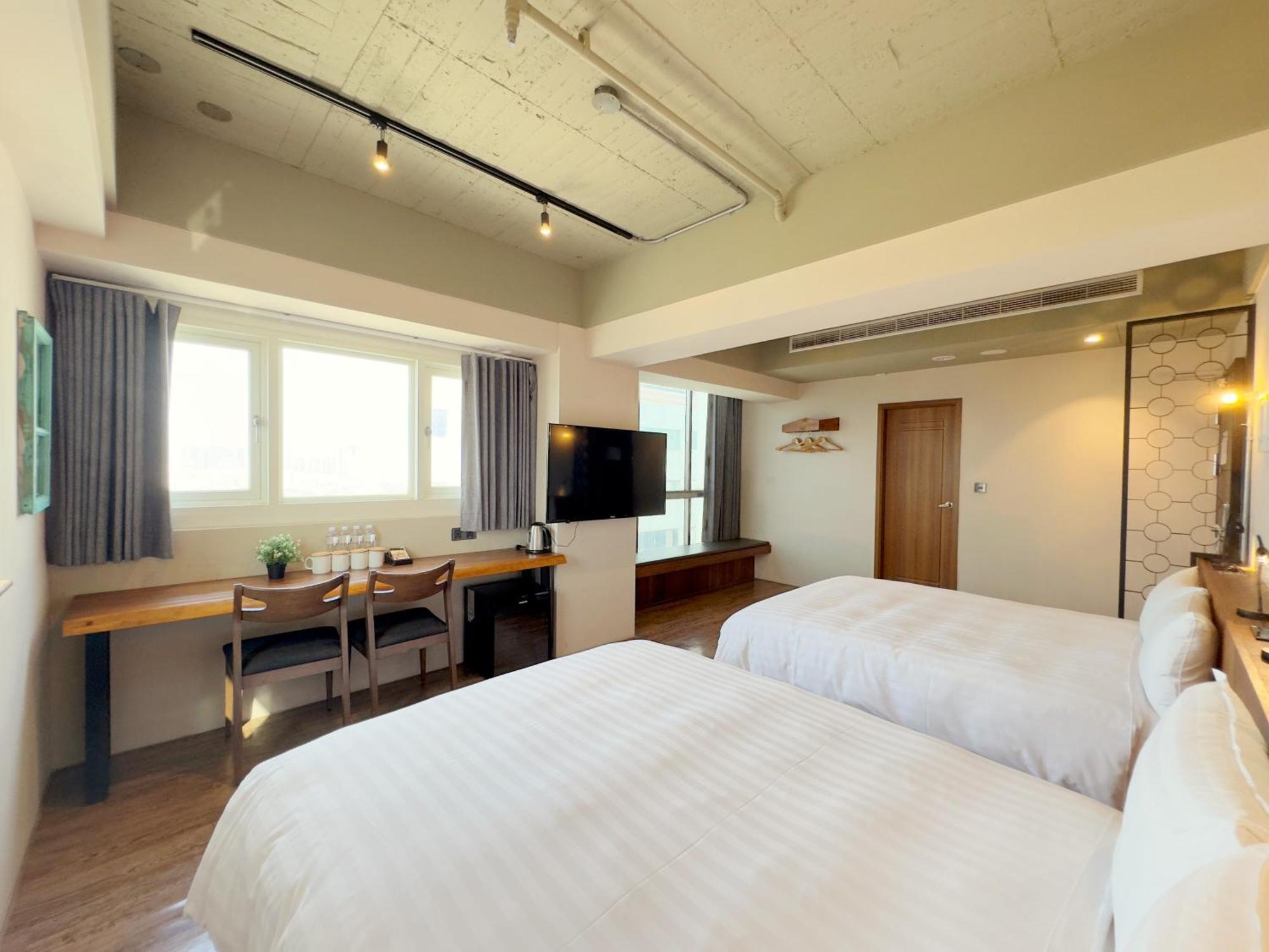 Roaders Hotel Tainan Chengda Habitación foto